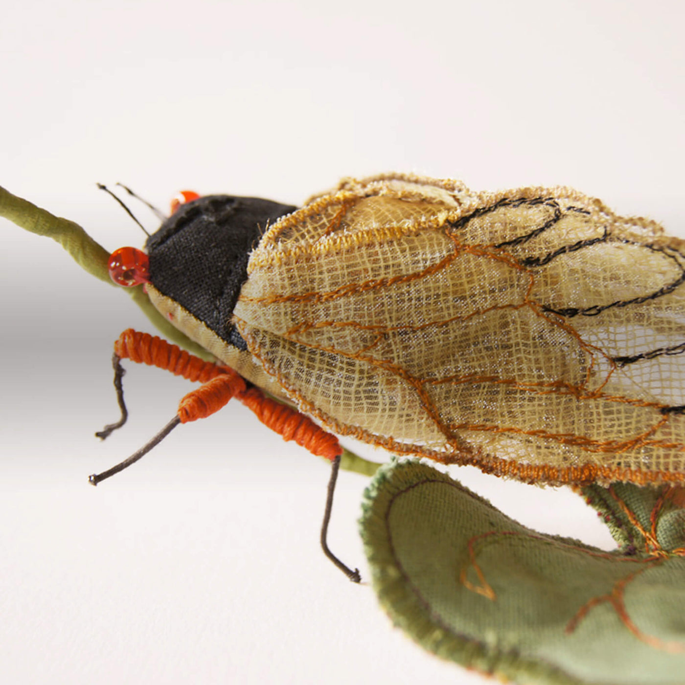Fiber art insects to wear and collect, handmade in France.