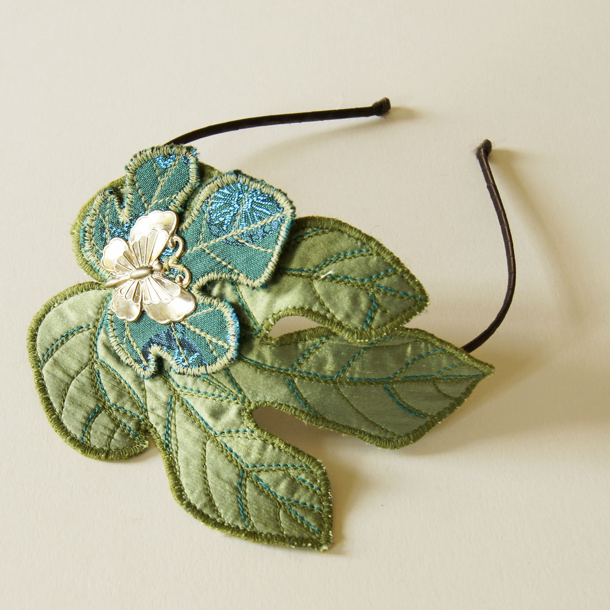 Fig Leaves headband fascinator in green and blue silk botanical accessory