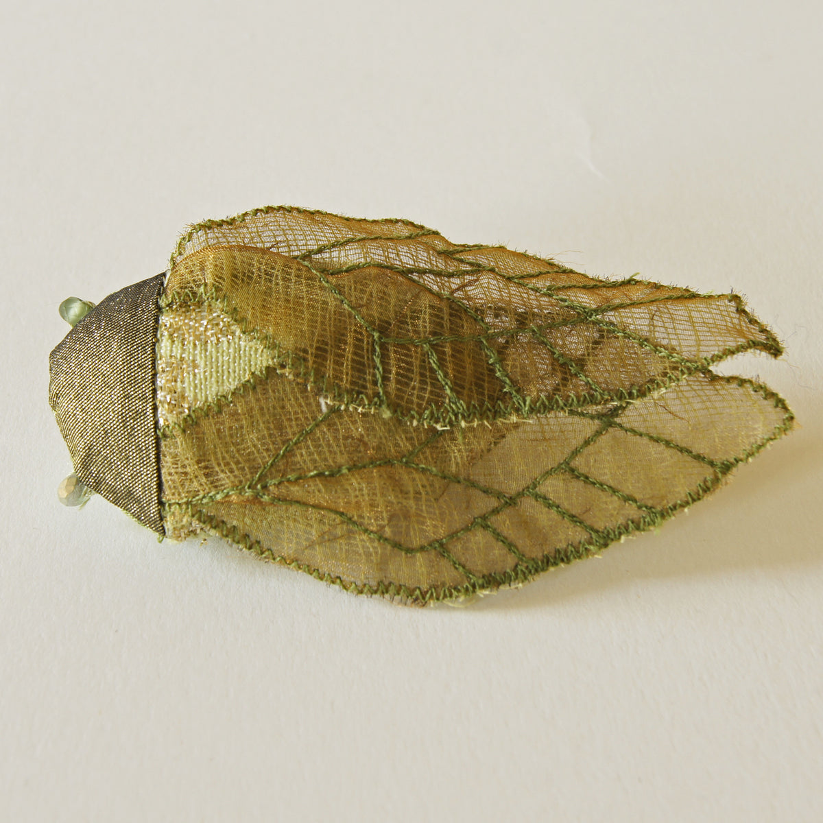 Cicada Soft Sculpture brooch green and gold vintage fabric
