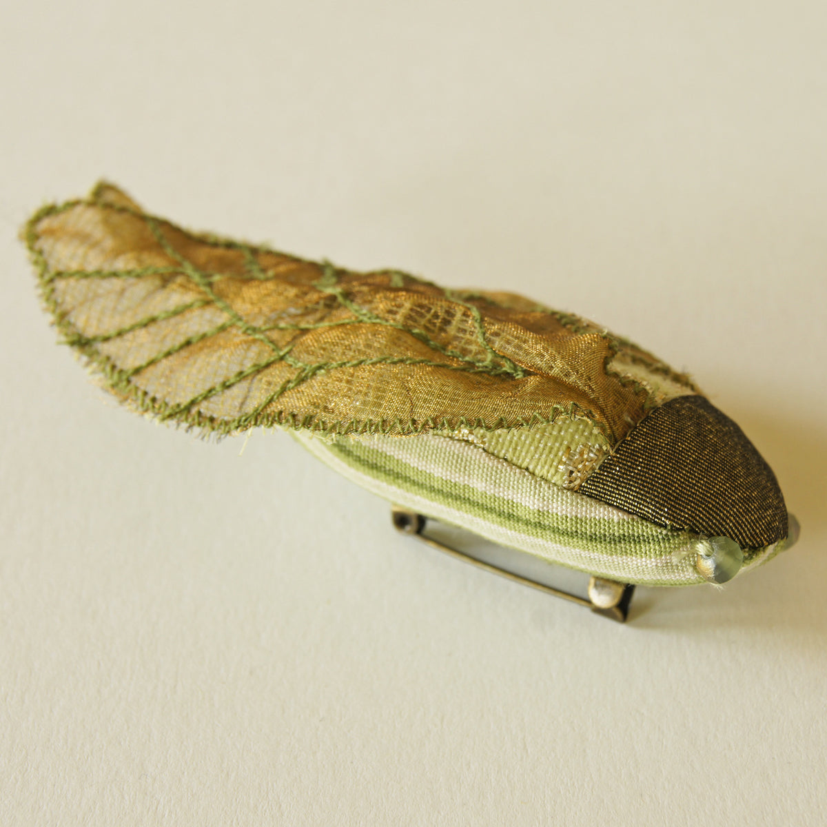 Cicada Soft Sculpture brooch green and gold vintage fabric