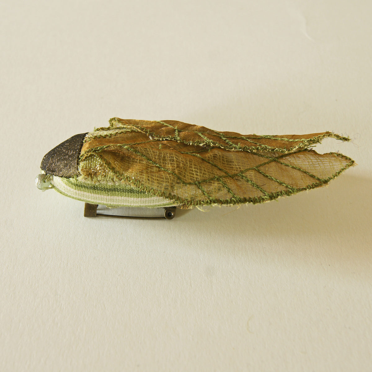 Cicada Soft Sculpture brooch green and gold vintage fabric