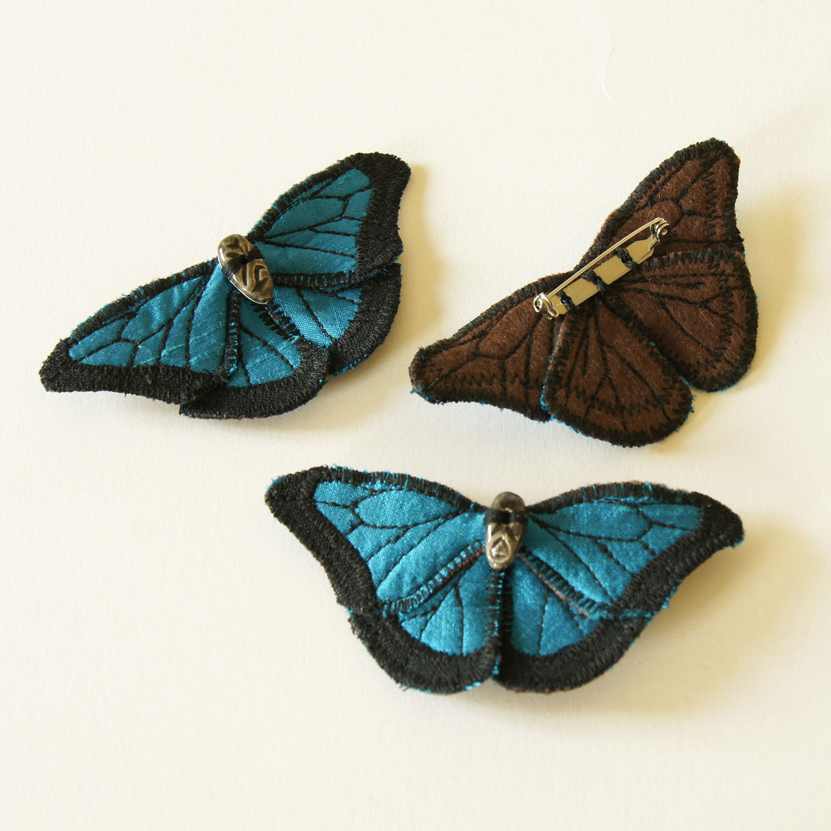 Blue Morpho fiber art brooch or hairclip silk linen ceramic