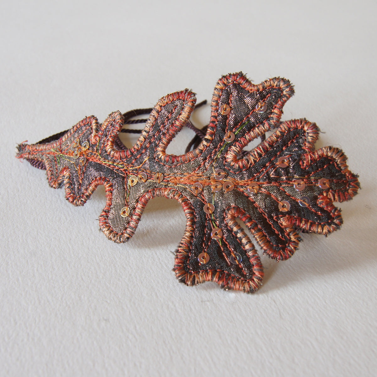 Brown and Copper oak leaf bun wrap