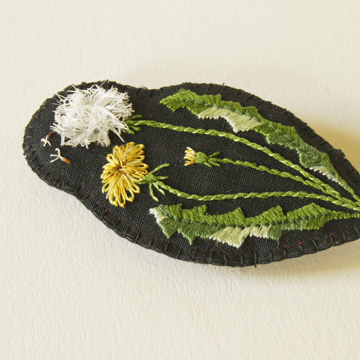 Embroidered dandelion brooch