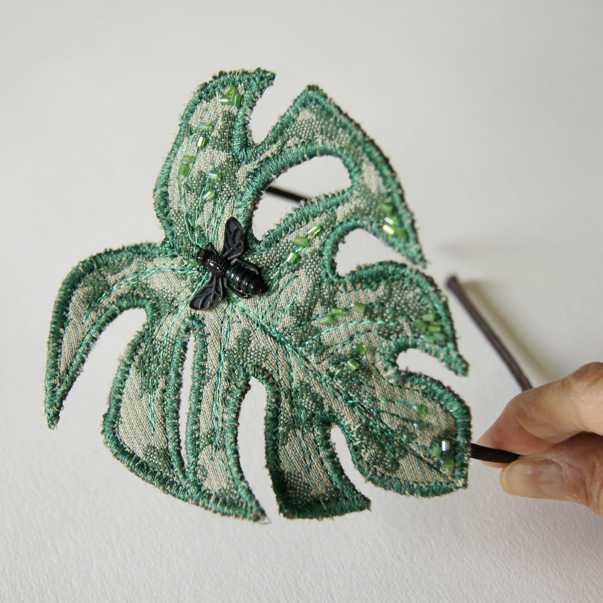 Monstera leaf headband in green jacquard