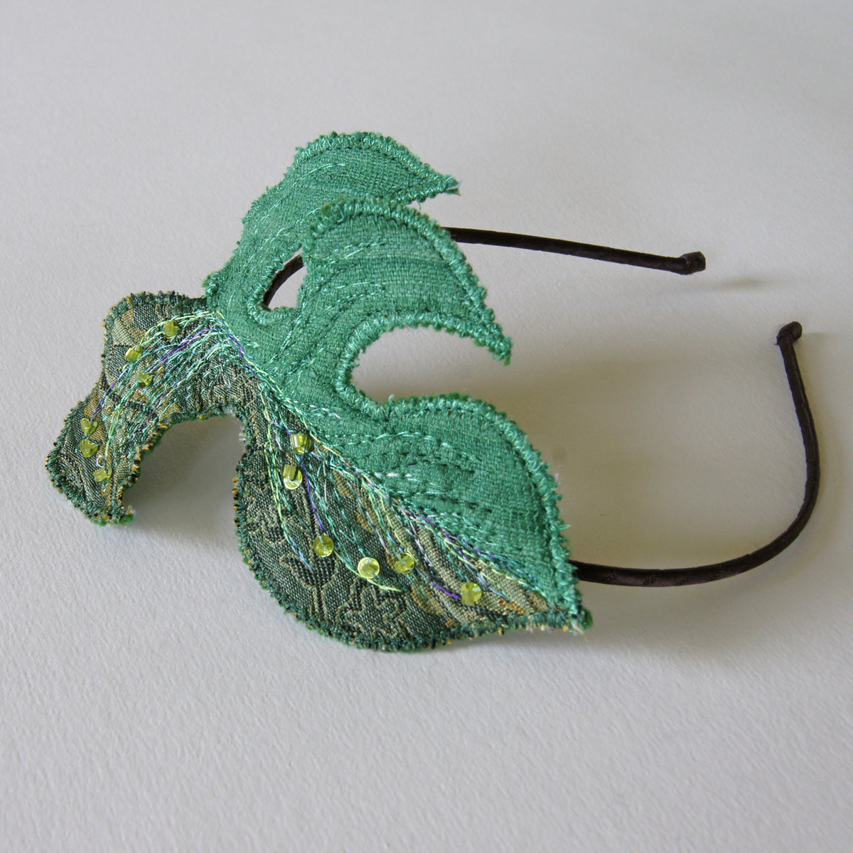 Rhaphidophora tetrasperma leaf headband in green silk and brocade